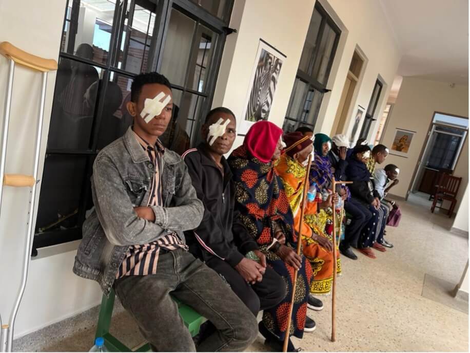 Patients with a dressing over the eye waiting for their check-up after surgery
